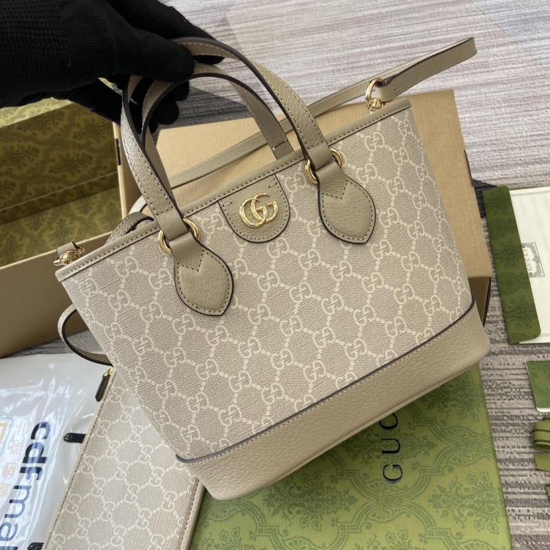 G*u*i shopping bags